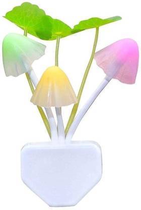 A mushroom night light with green, yellow, and pink caps and green leaves is displayed against a white background.