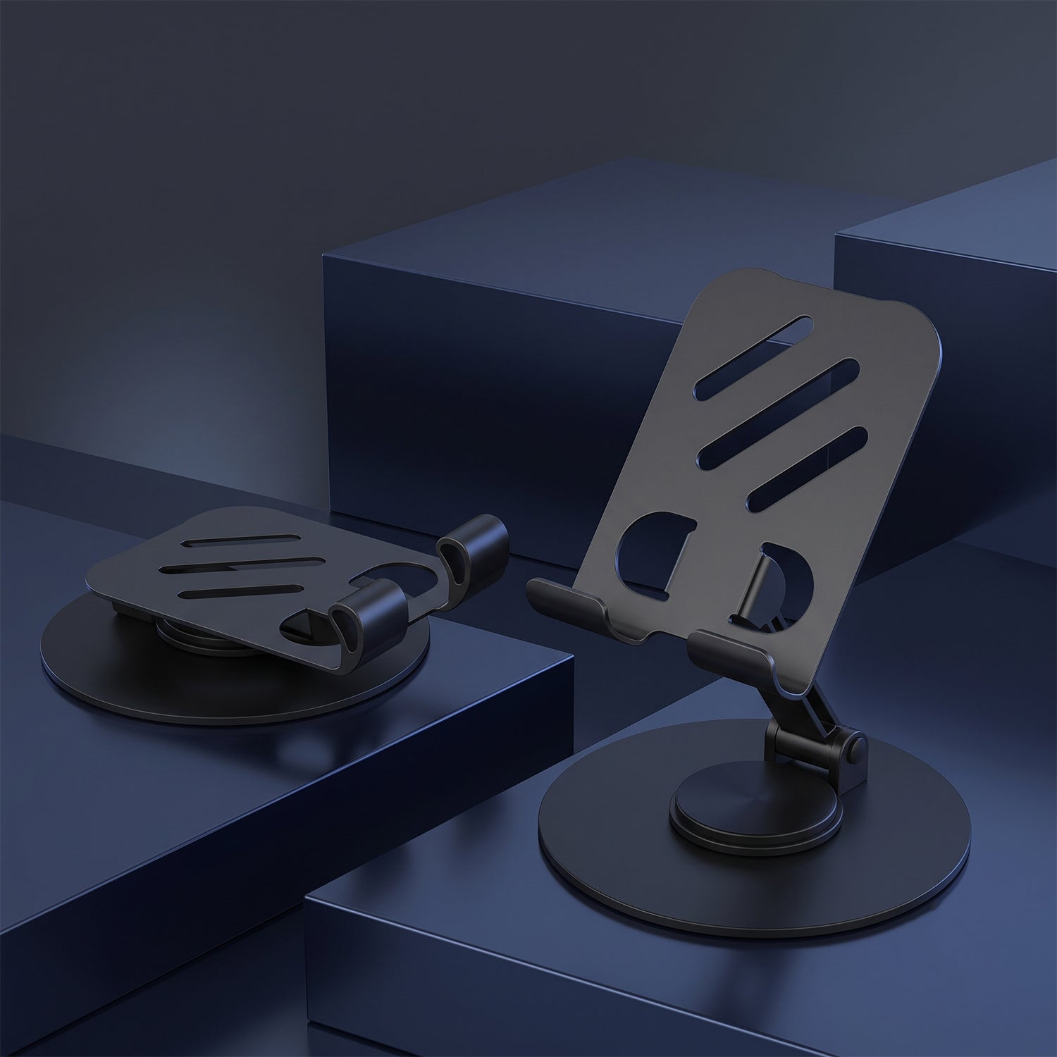 Two black metal mobile stands, one folded flat and one upright, on dark blue geometric blocks.
