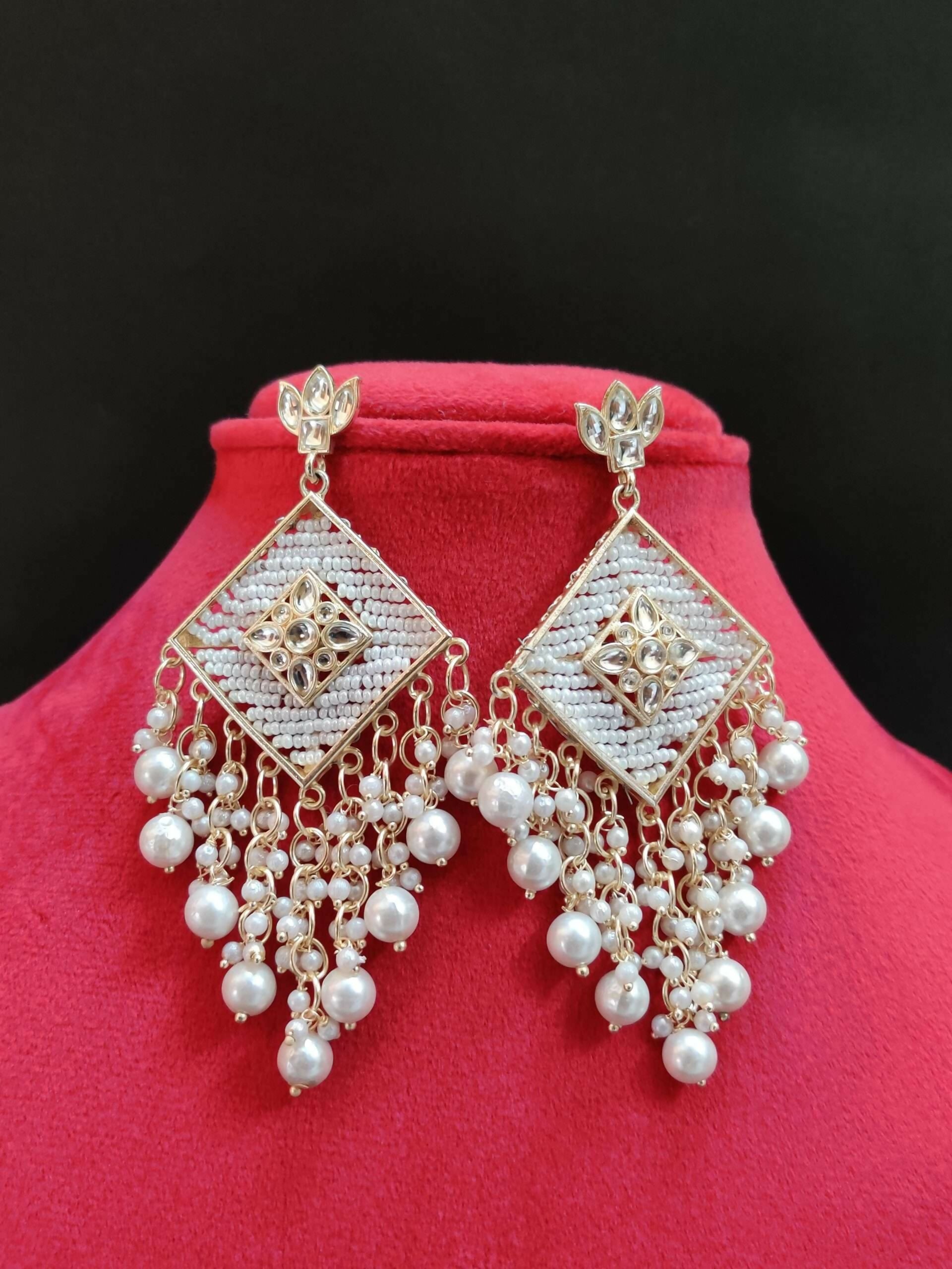 Traditional Kundan Stud Earrings with White Seed Bead Work and Pearl Drops.