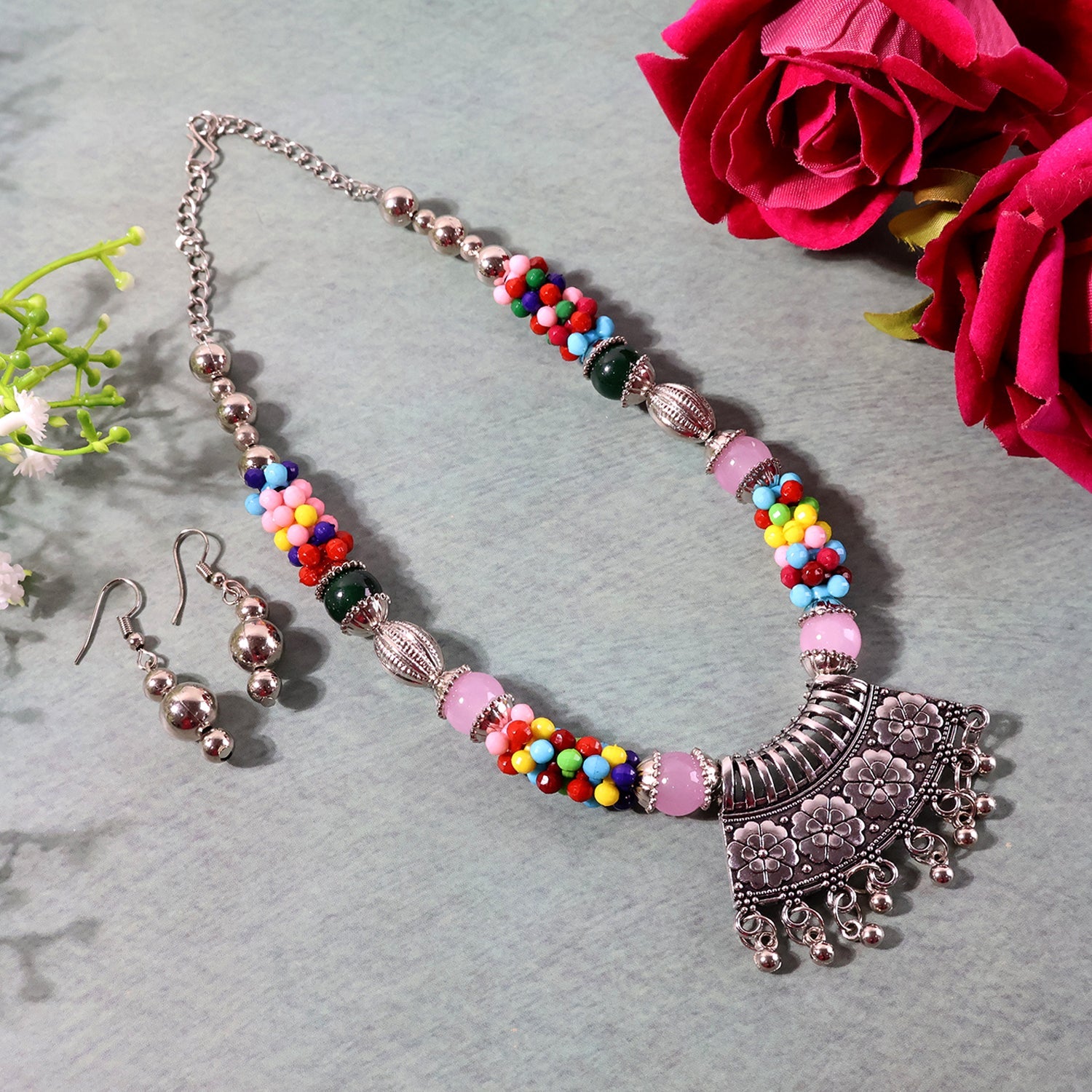 Side shot of oxidised multicolor beaded necklace and matching earrings