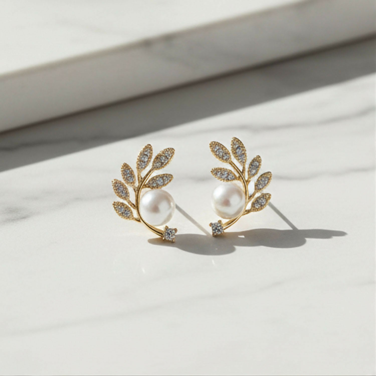 Luxurious Crystal Leaf & Pearl Ear Climbers – 14K Gold Plated Botanical Studs