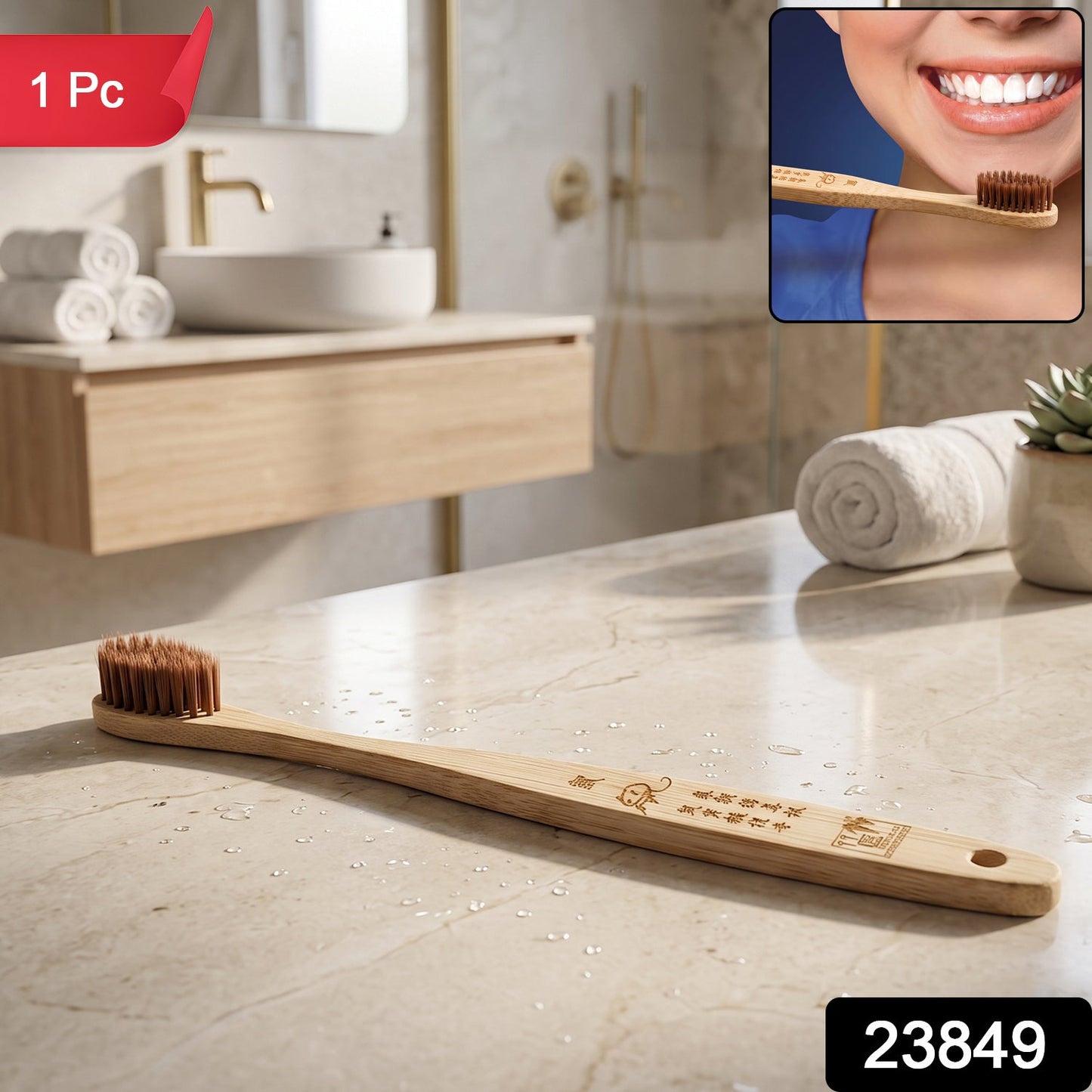 A bamboo toothbrush with brown bristles and an engraved handle rests on a marble bathroom counter with water droplet 