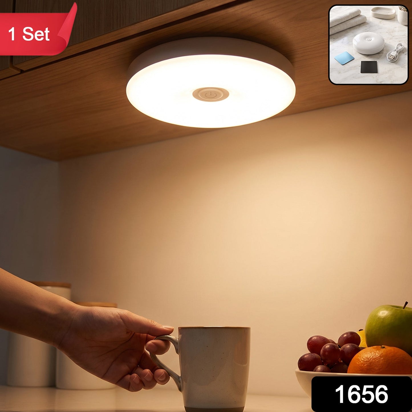 A hand reaches for a mug under a bright, round LED light mounted beneath a wooden cabinet, illuminating a fruit bowl