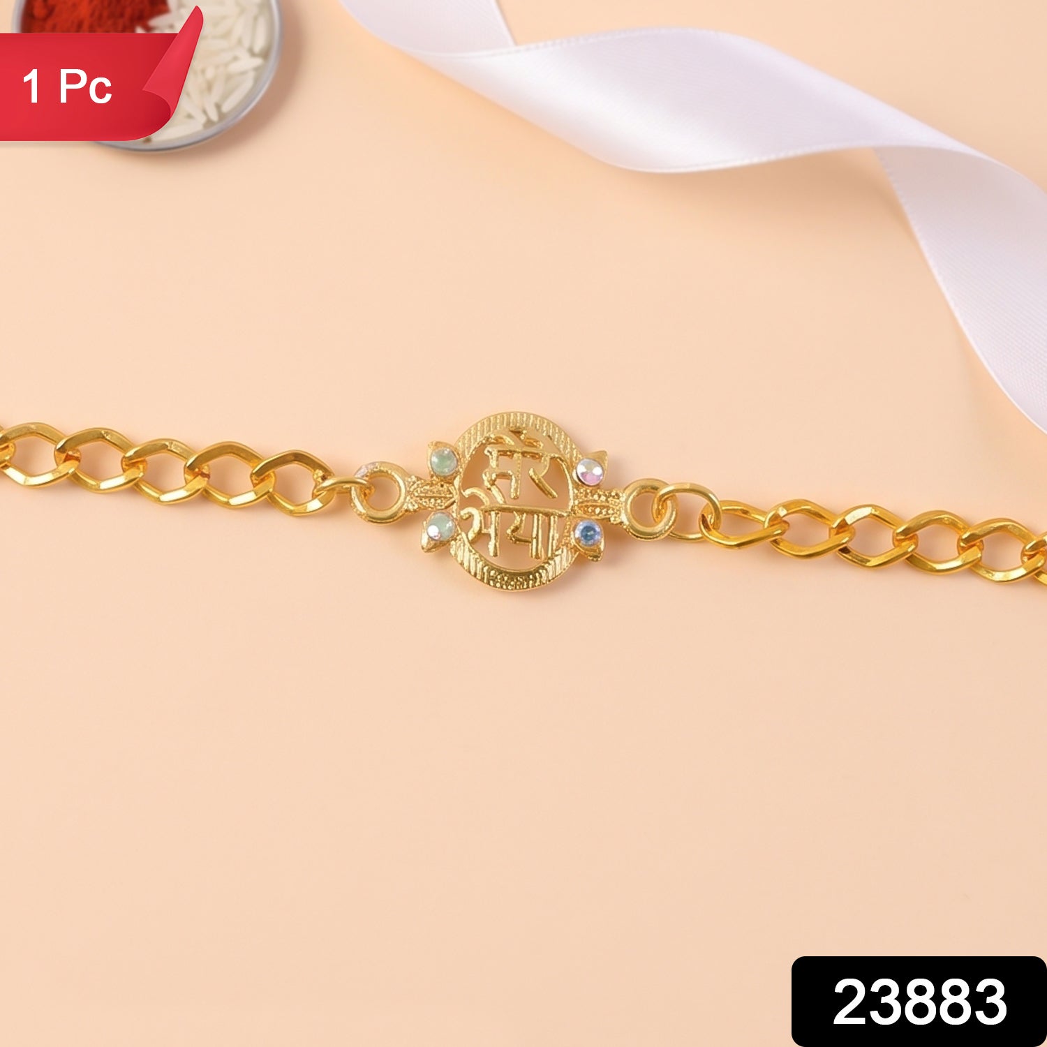 Close up of Mere Bhaiya pendant rakhi with colourful stones on a gold chain.