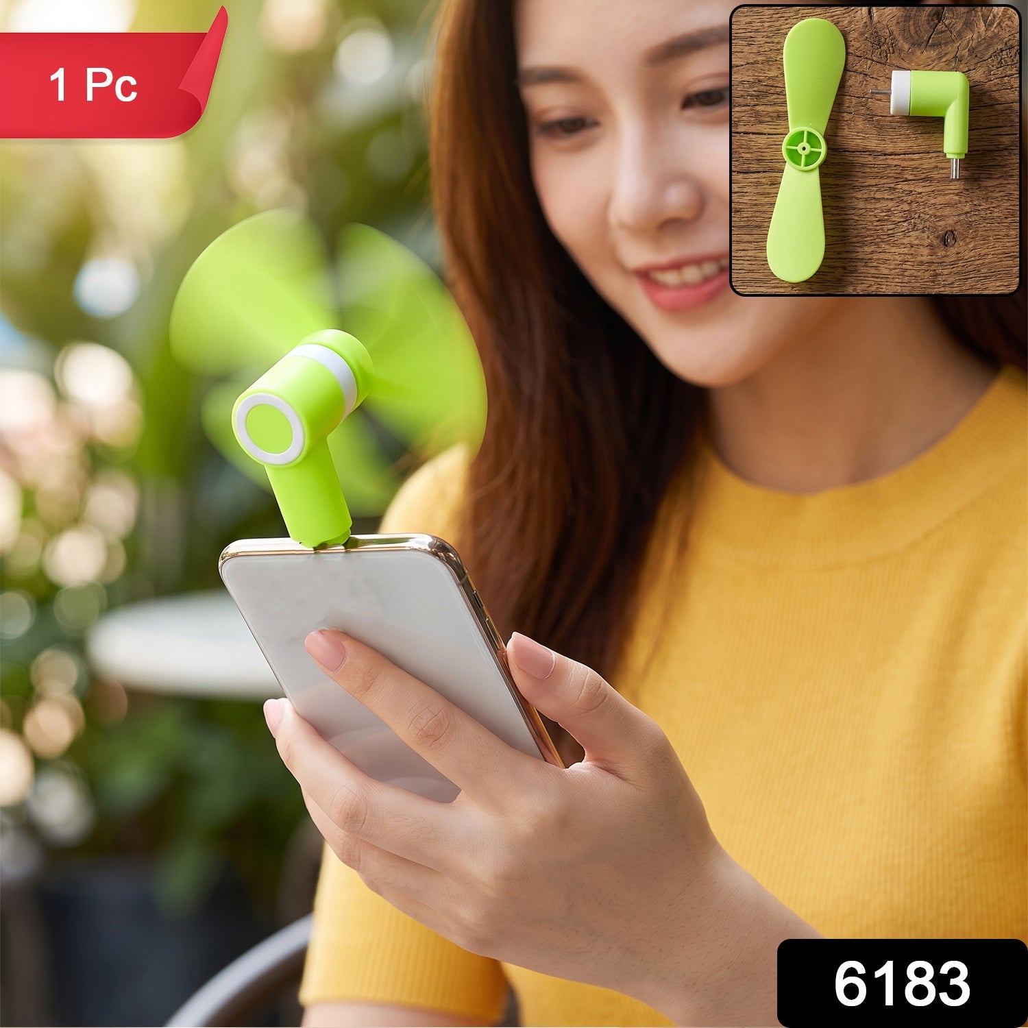 A woman holds a phone with a bright green USB-C fan plugged in, with a "1 Pc" label and number 6183.