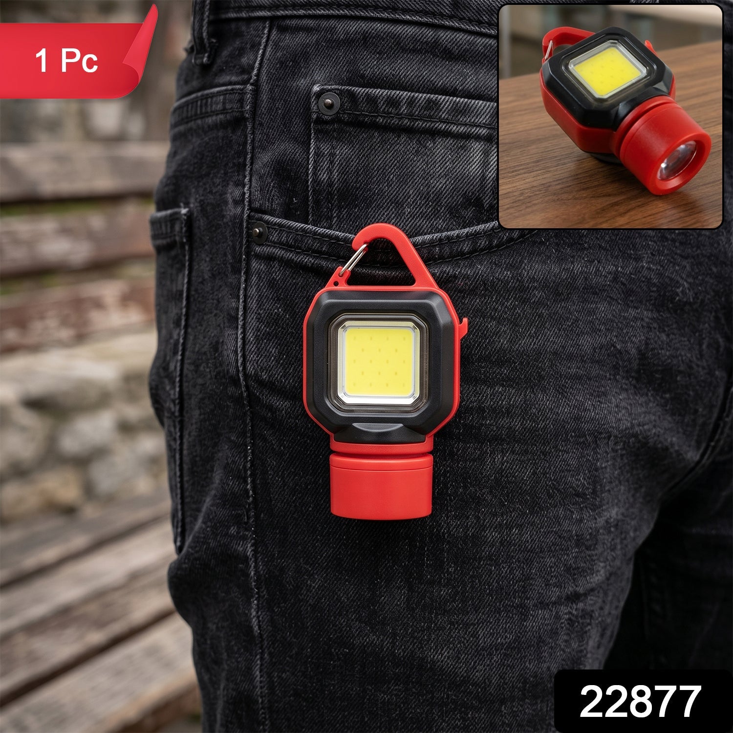 Red and black mini LED flashlight with a carabiner clip attached to a black jeans pocket, with '1 Pc' and '22877' overlay