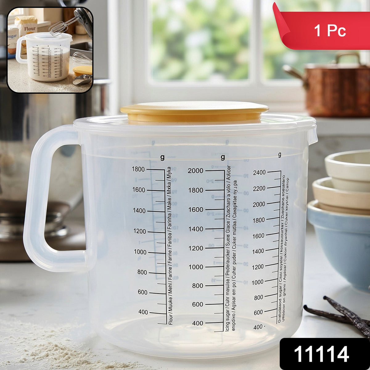 A clear plastic measuring jug with a yellow lid, featuring a red '1 Pc' label and a black '11114' label.