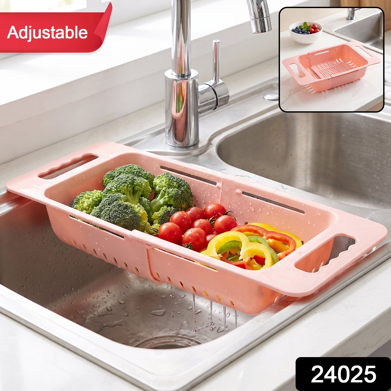 Pink plastic adjustable over-sink drain basket with vegetables