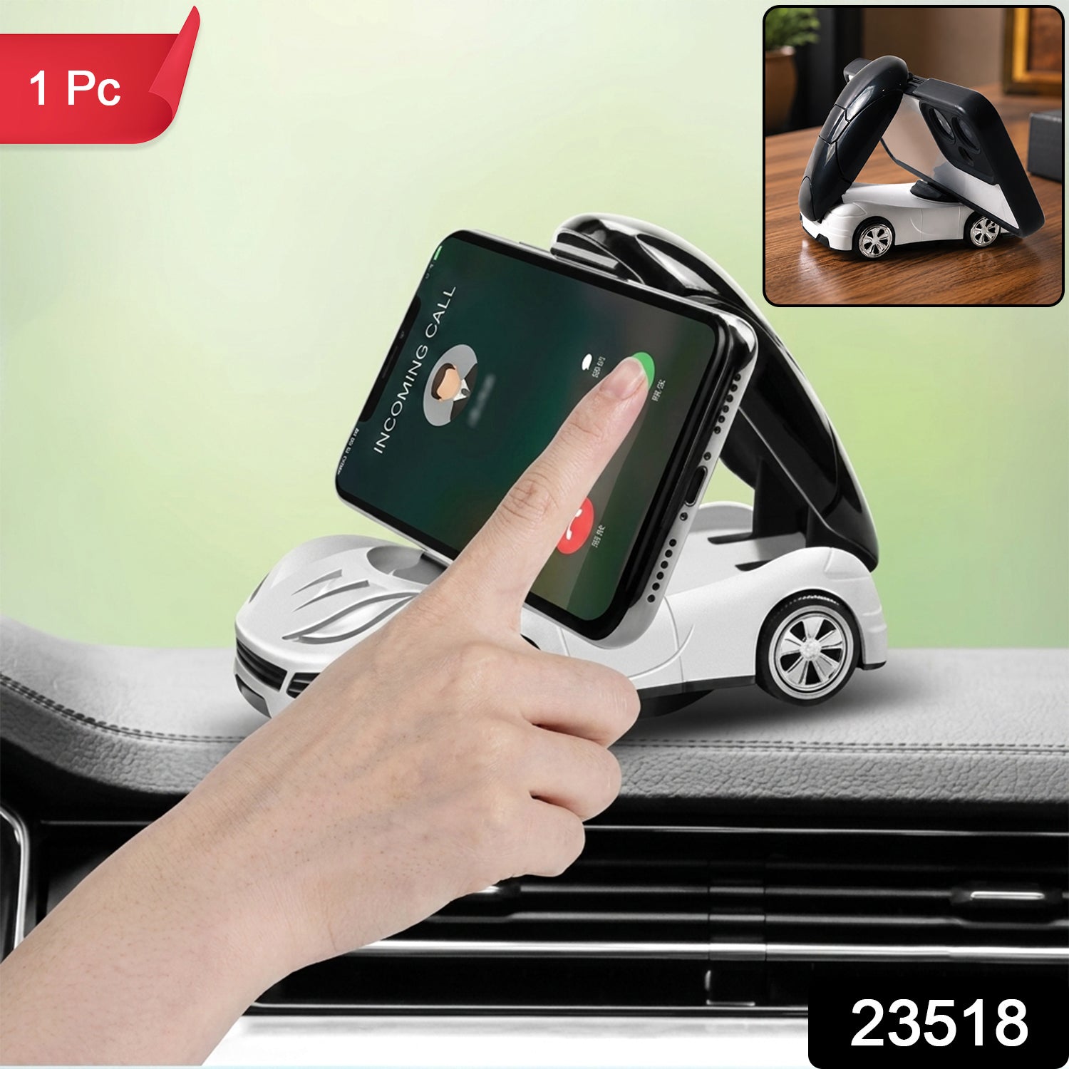 A hand touches a smartphone in a white car-shaped holder on a dashboard, with '1 Pc' and '23518' labels.