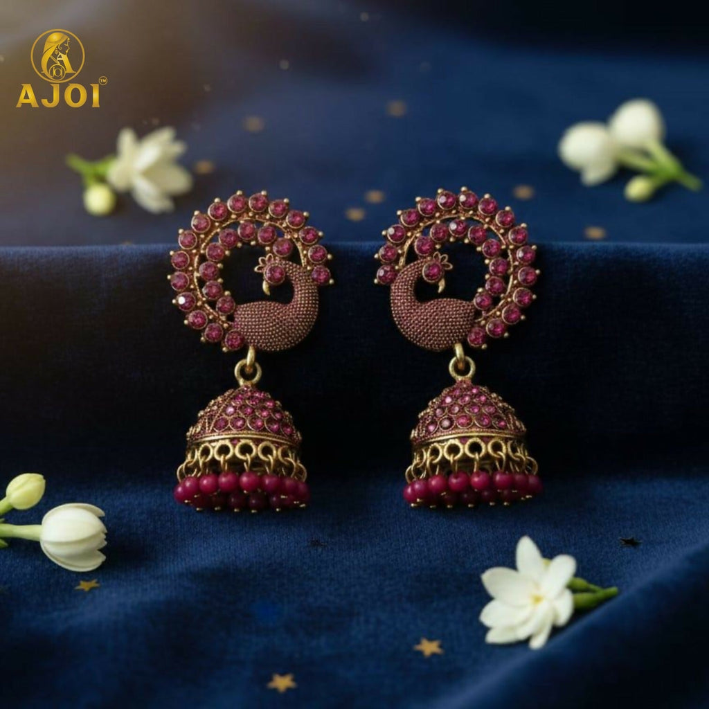 Peacock Motif Ruby-Tone Jhumka Earrings in Antique Gold Finish