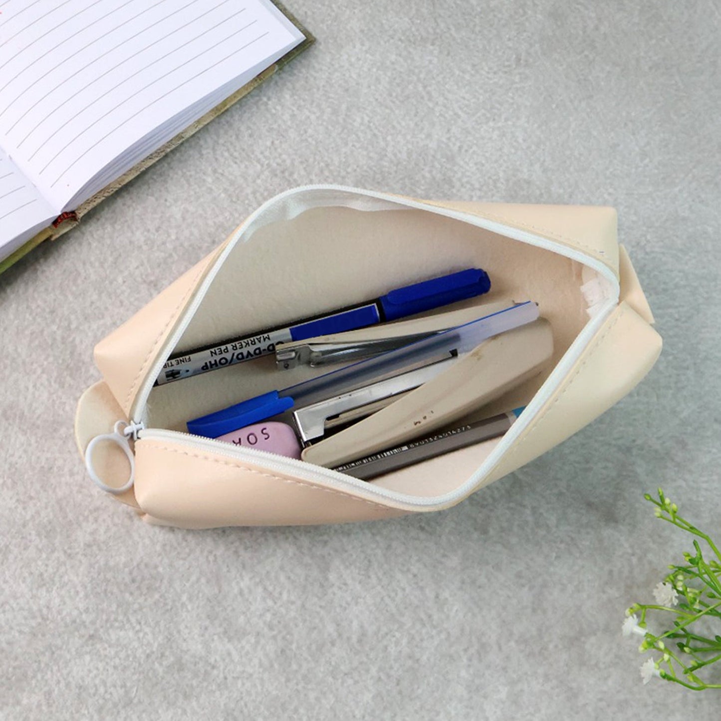 Stylish PU leather stationery case with durable stitching and a compact design.